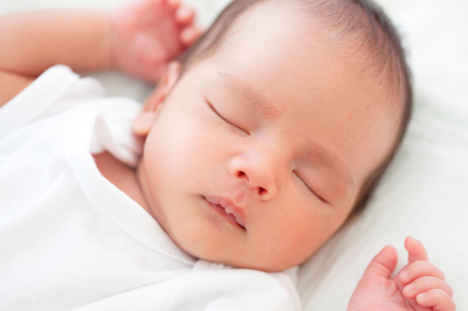 Baby Sleeping in White